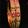 Elegant Gold Plated Impon Bangles with Red and Green American Diamond Stones – Traditional Design for Women – Festive & Wedding Wear